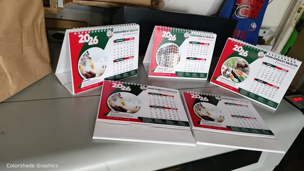 Branded 2026 desktop calendars standing in a row