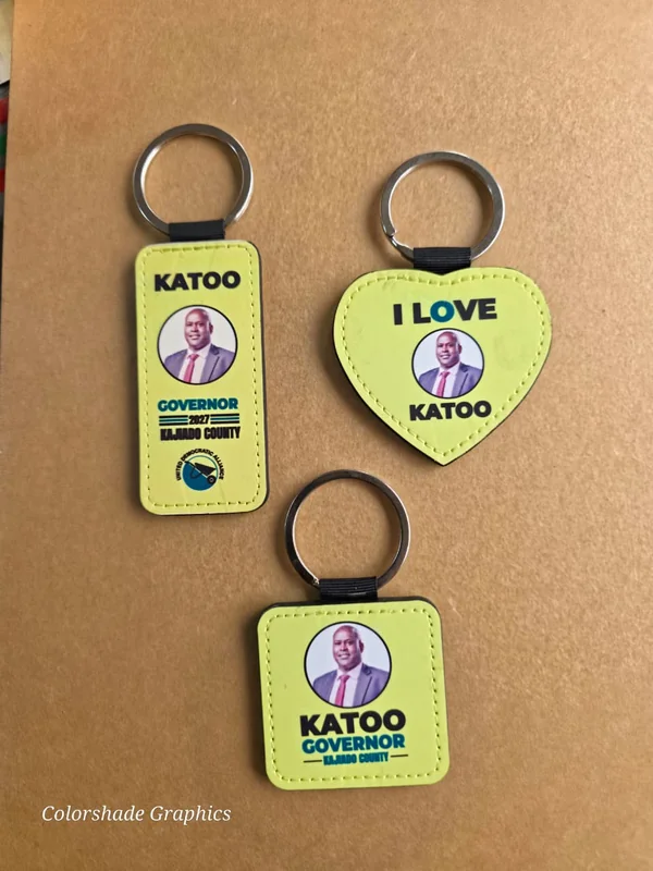 Yellow sublimation keychains in rectangle, heart and square shapes, printed for a campaign