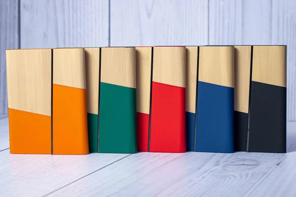 Two-tone notebooks with a diagonal bamboo and leatherette cover, in five colours