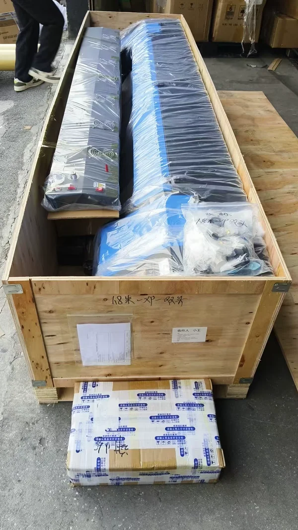 Large format printer crated for delivery by Colorshade